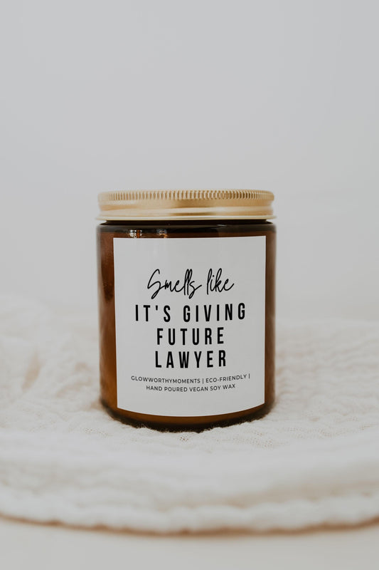 New lawyer celebrating passing the bar exam with humorous candle