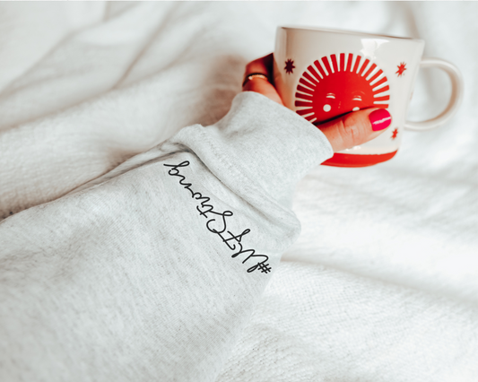 Floral 'The Best Miracles' IVF pregnancy announcement sweatshirt