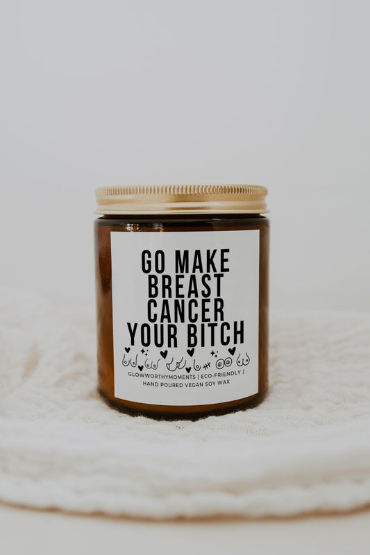 Laughing survivor with bold cancer candle during treatment