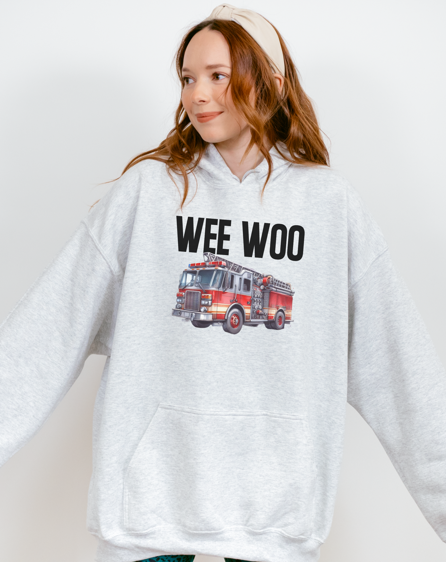 Close-up of retro fire truck graphic on hoodie pocket