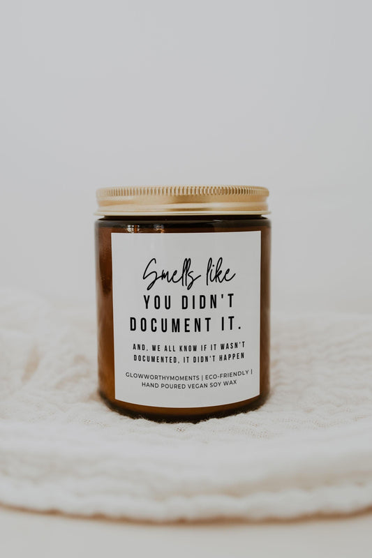 Coworkers laughing at funny HR candle during office party