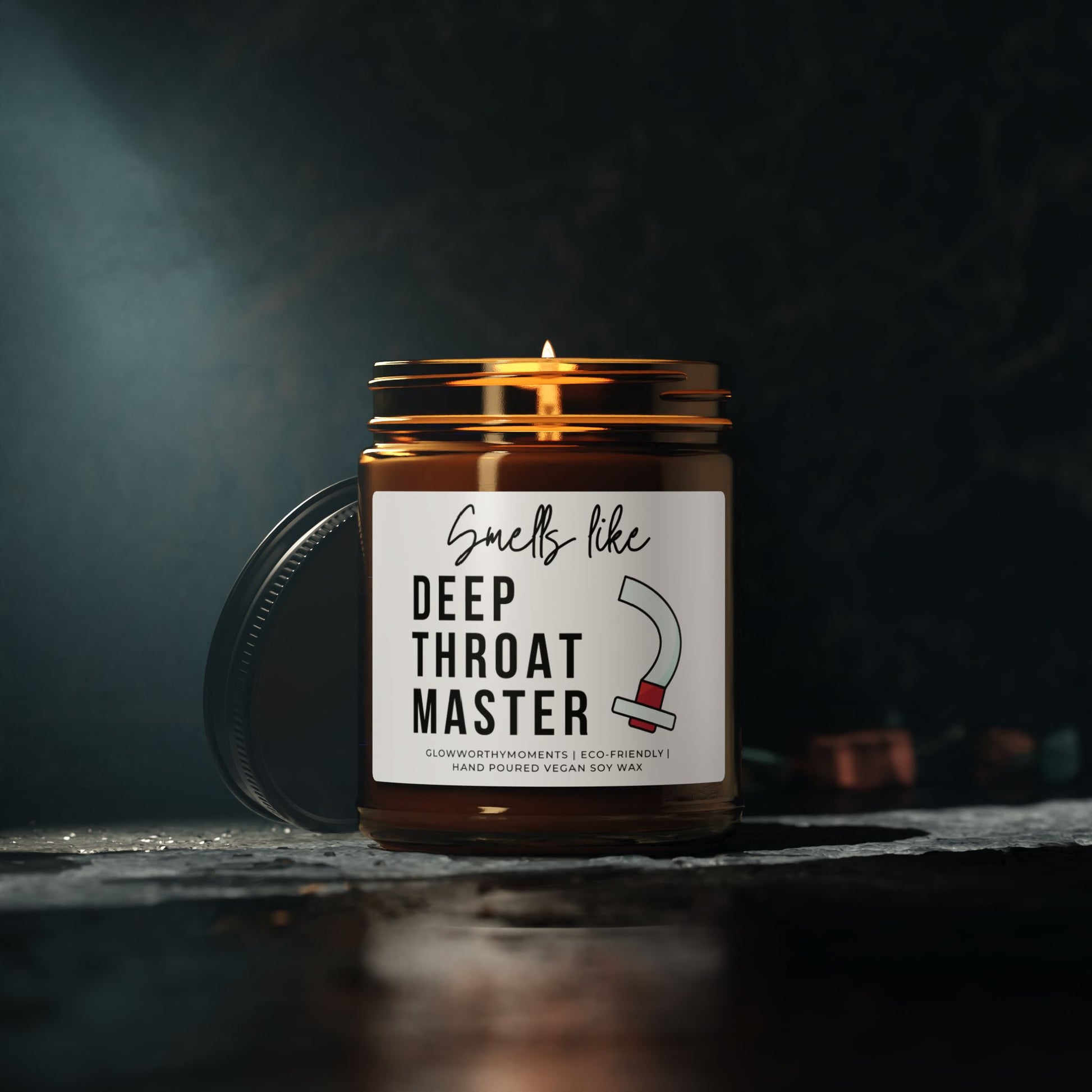 Candle in a jar with a humorous label on a dark background