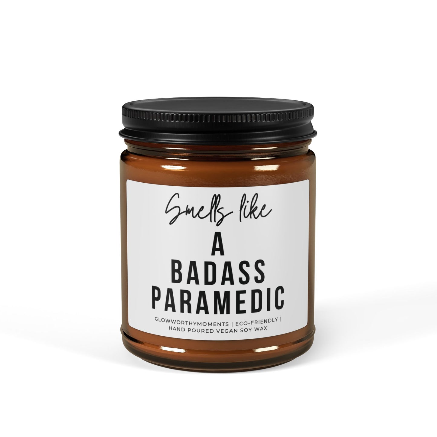 Candle jar with a label reading 'Smells like a badass paramedic' on a white background