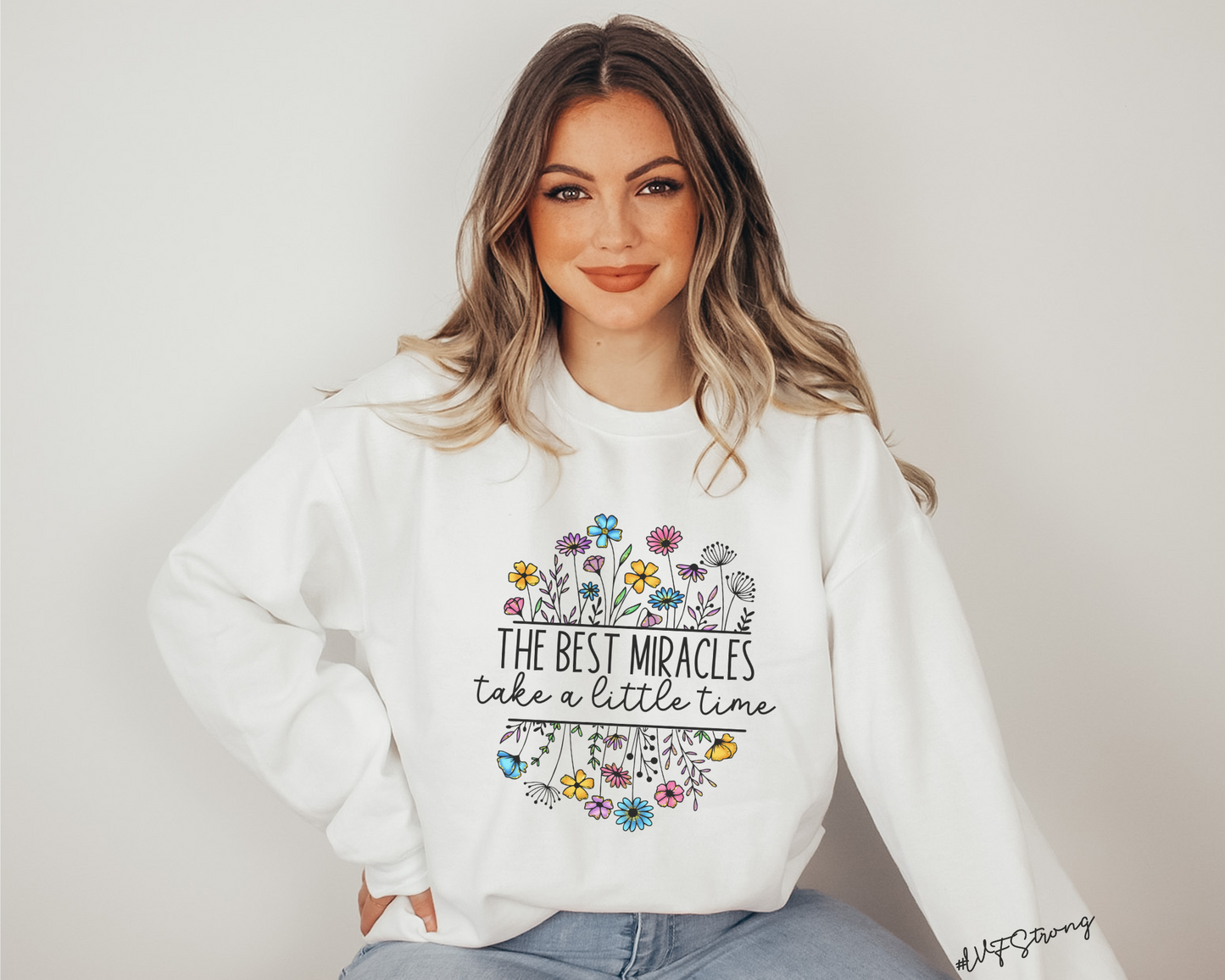 Floral 'The Best Miracles' IVF pregnancy announcement sweatshirt