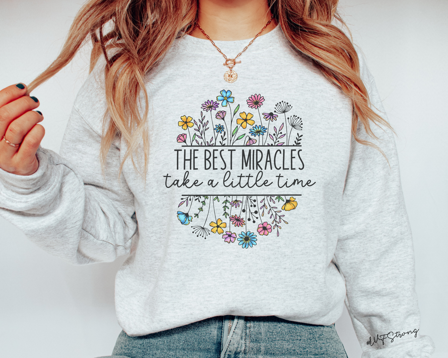 Floral 'The Best Miracles' IVF pregnancy announcement sweatshirt