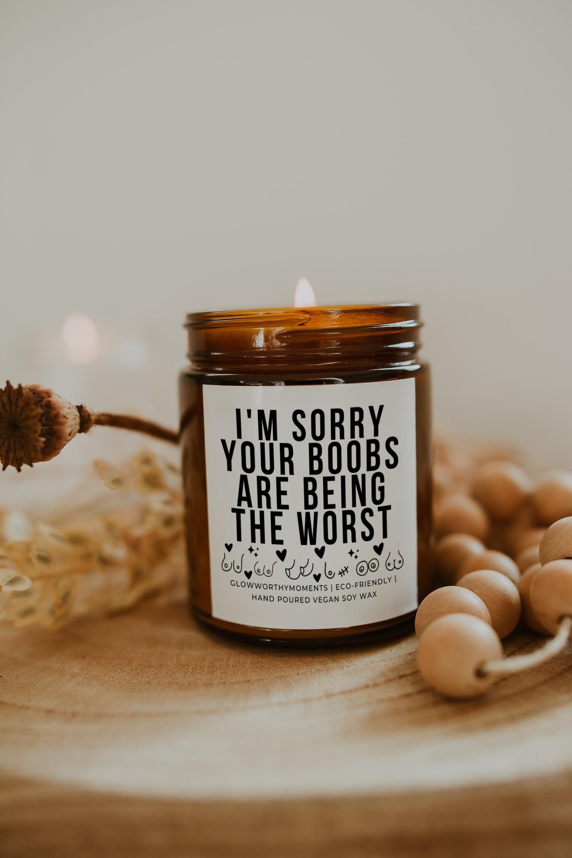 Friends gifting personalized candles to BRCA warrior