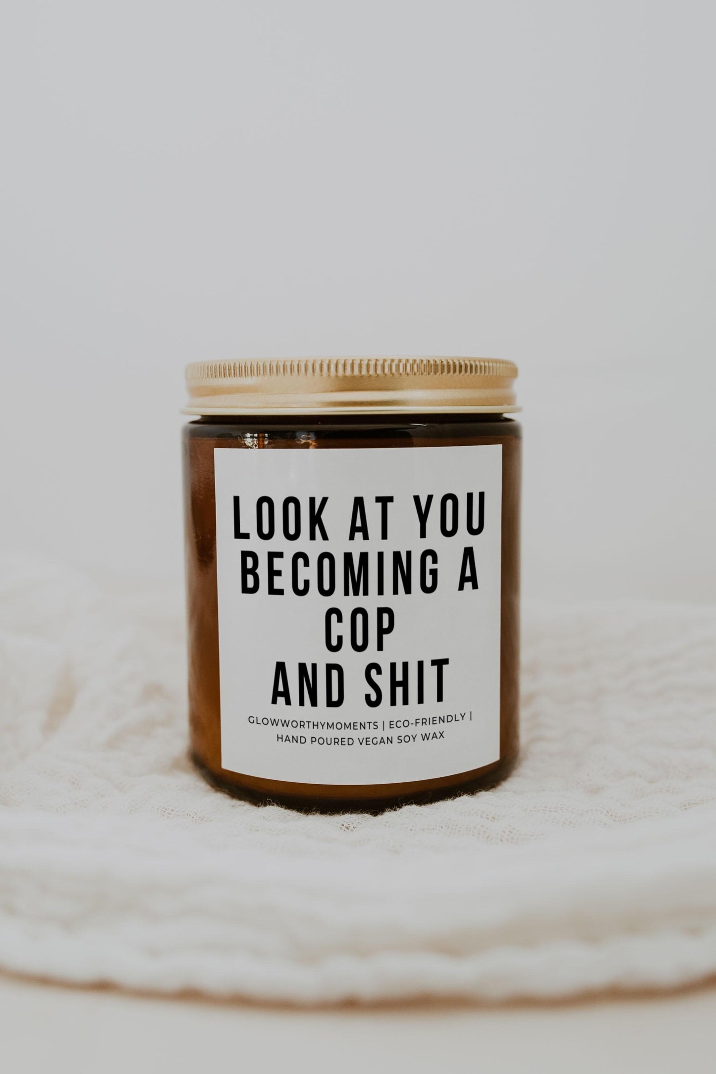 Funny police candle in precinct