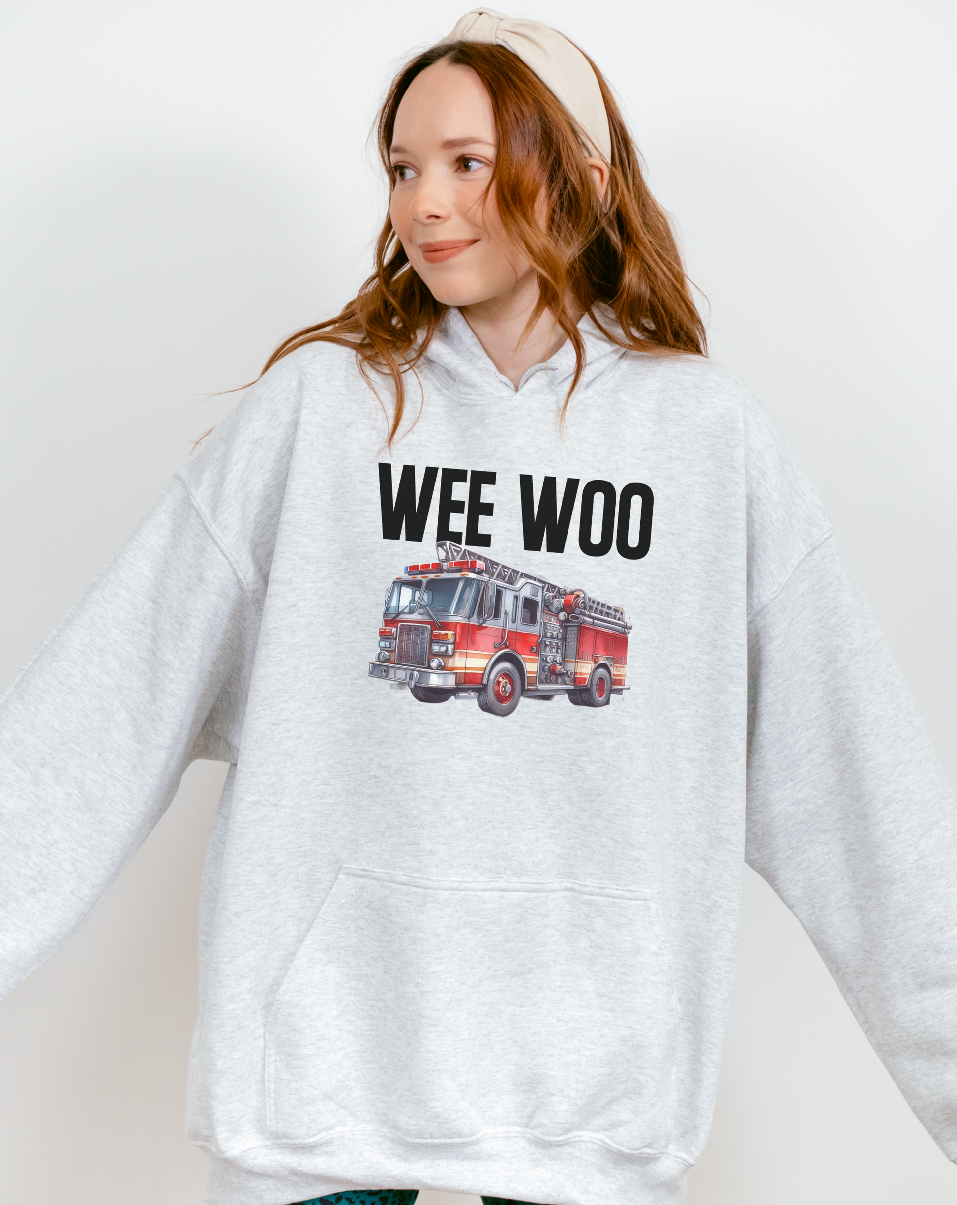 Close-up of retro fire truck graphic on hoodie pocket