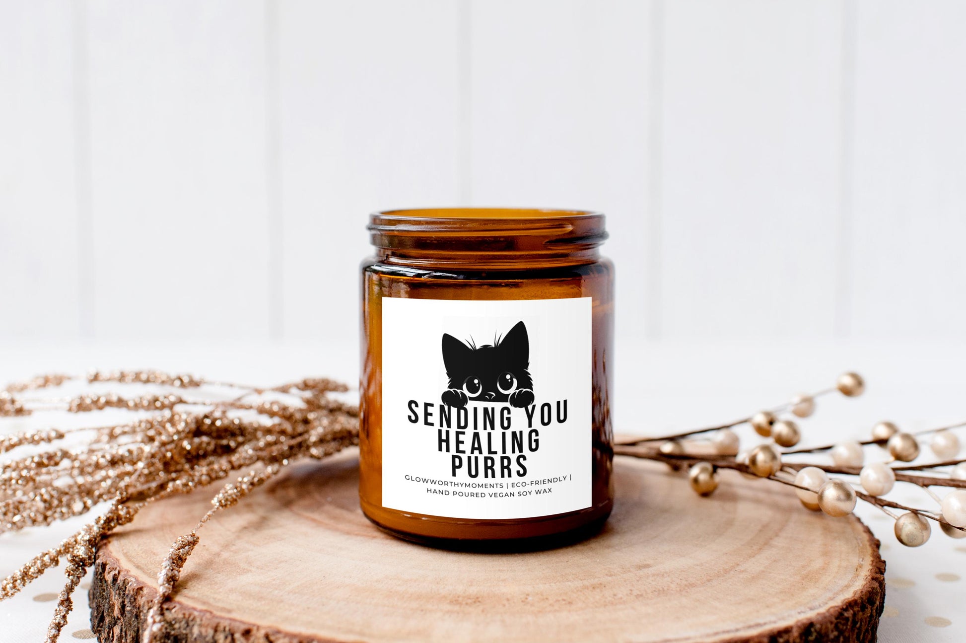 glass cat candle glowing softly