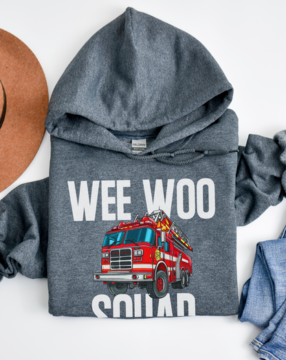 Gray hoodie with a red fire truck graphic and 'Wee Woo Squad' text on a white background