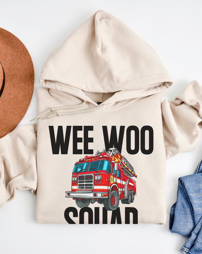Beige hoodie with a red fire truck graphic and text on a white background